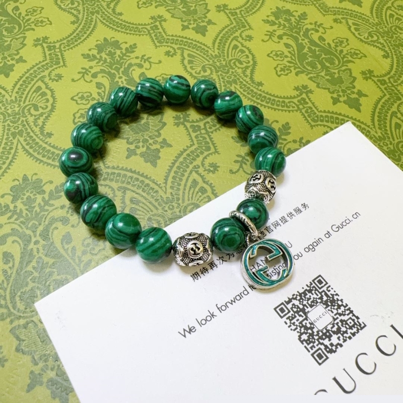 G*u*i bracelets